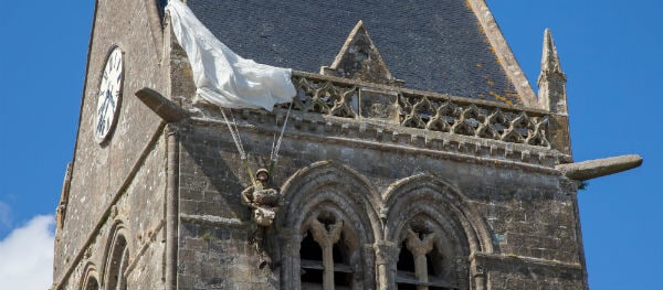 HThe memorial on the bell tower of the church in Sainte-Mère-Église