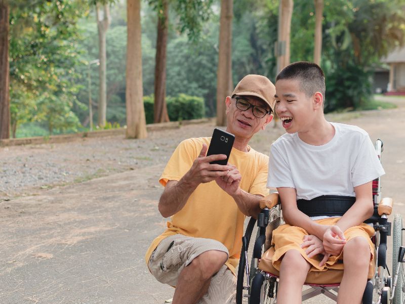 Taking selfies together on holiday; great fun!